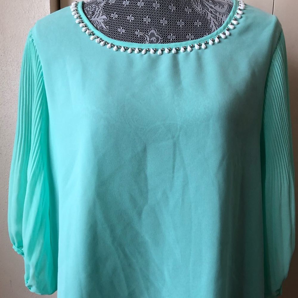 Beautiful teal/ sea foam green sheer top